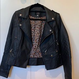 Leather jacket with cheetah on the inside!